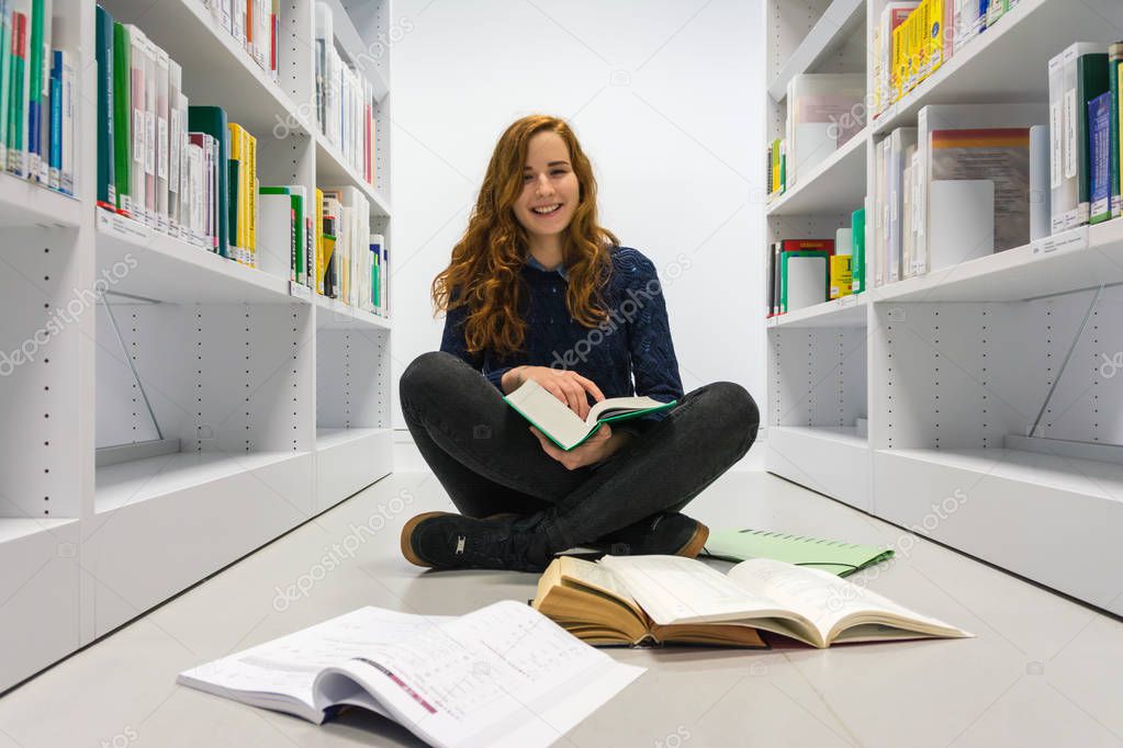 Clever University Student Studying in White Modern Library Books