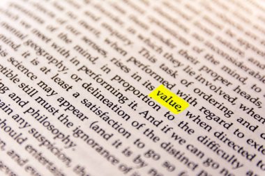 Book Highlighted Word  with Yellow Fluorescent Marker  -  Value