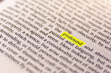 Book Highlighted Word  with Yellow Fluorescent Marker -  Profound