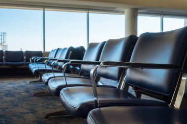 Airport Chairs in  Terminal at Daytime