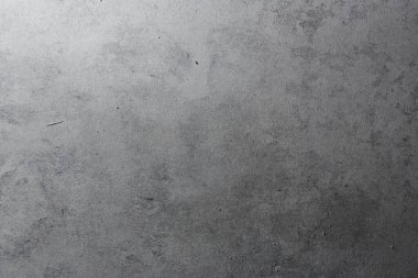 Eski püskü, gri metalik arka plan. Çizikler ve hasarla yaşlanmış grunge dokusu