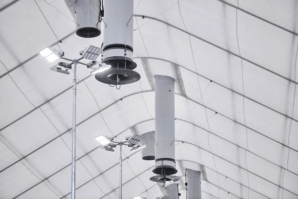 Industrial indoor ventilation system on an automated cow farm, modern technology in the factory