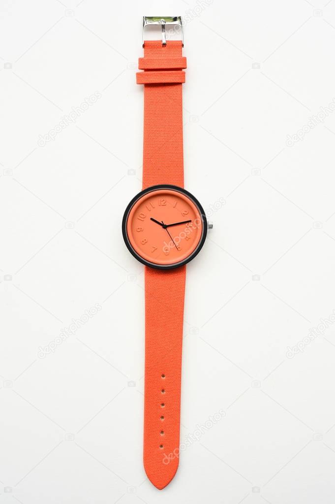 Orange wristwatches isolated on white background