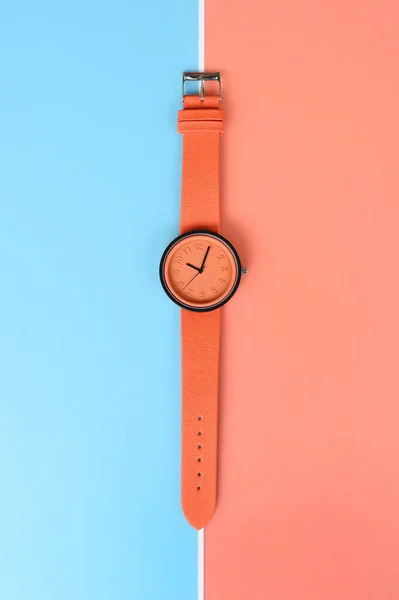 Nahaufnahme Orangefarbener Armbanduhren Als Hintergrund — Stockfoto