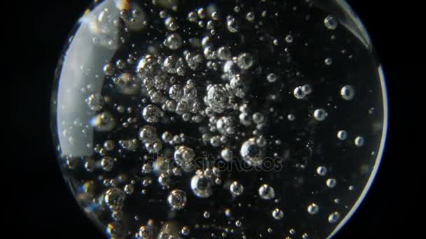 Orbe giratorio lleno de burbujas — Vídeos de Stock