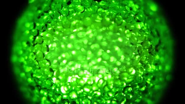 Rotating Green Glass Planet of Orbs — Stock Video