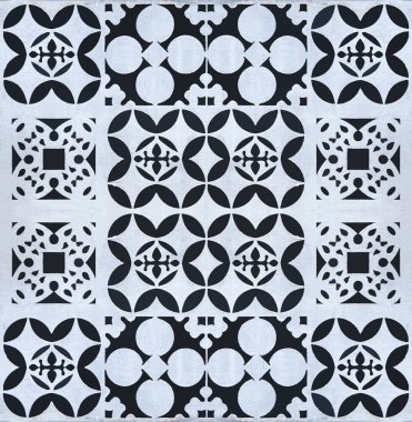 Soyut geometrik çiçek desenli paslı çelik levha arka planda kesintisiz.