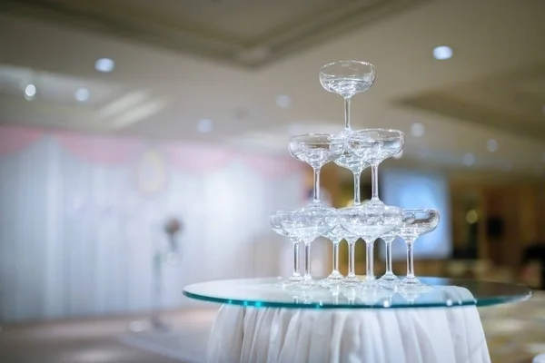 Champagne tower in wedding ceremony. - Selective focus