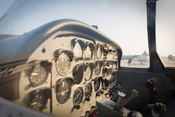 View of the cockpit of a small plane. - (Selective focus)