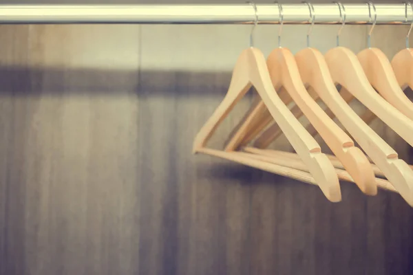 Clothes hanger in wardrobe — Stock Photo, Image