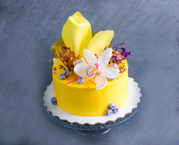 yellow cream cheese cake with chocolate twist and isomalt decora