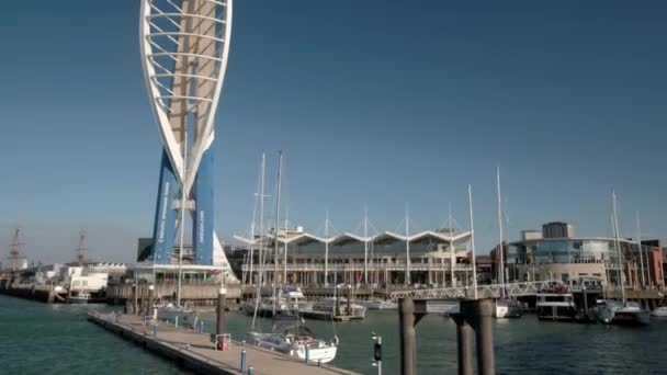 Slow Tilt Spinnaker Tower Moving Boat Departing Quay Portsmouth England — Stock Video