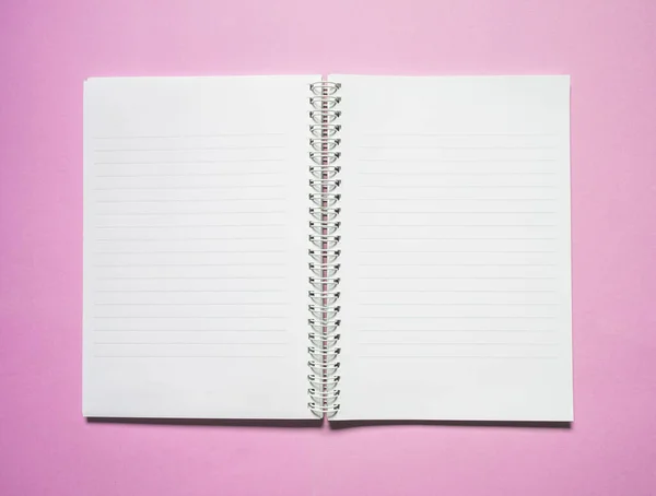 Top view, School notebook on a purple background,  Notebook on color paper