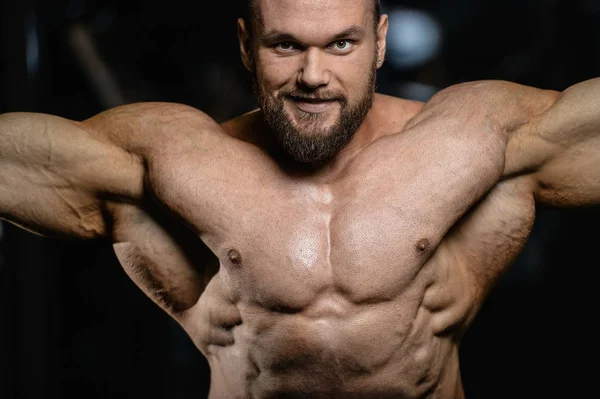 Brutální silné kulturista atletické muži vyšroubuje svaly s d — Stock fotografie
