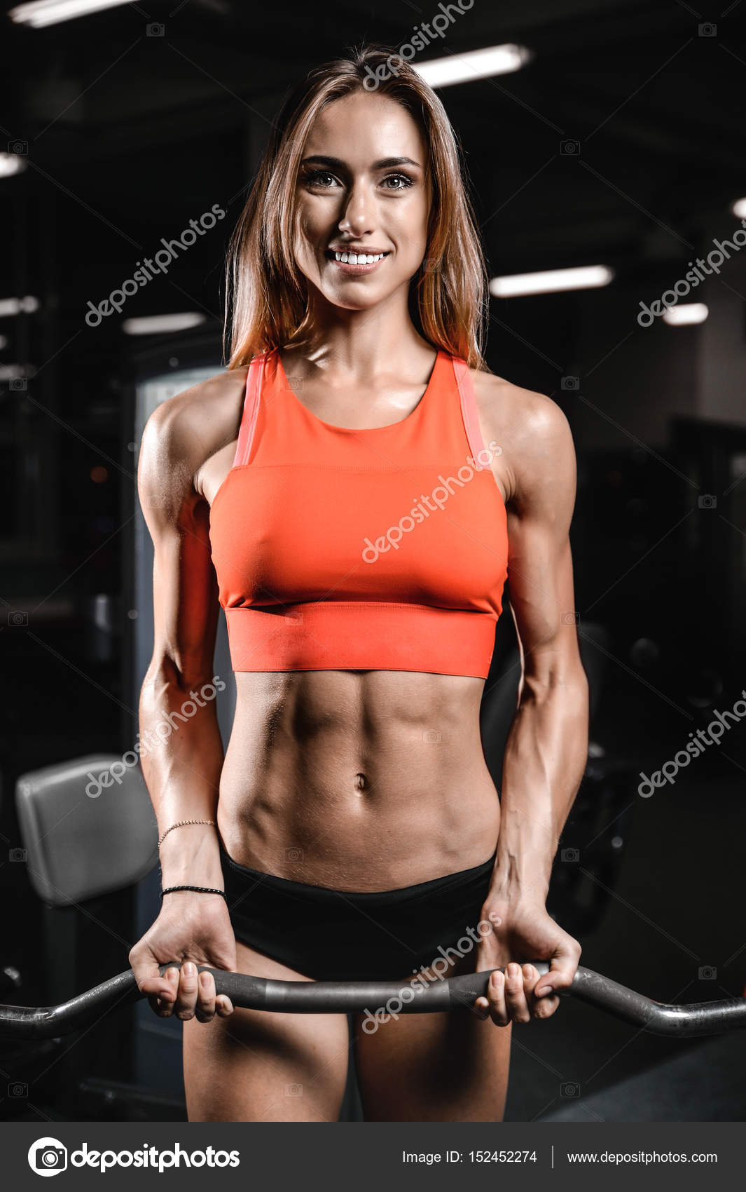 Caucasian pretty fitness girl on diet training pumping up muscle Stock  Photo by ©antondotsenko 152452274