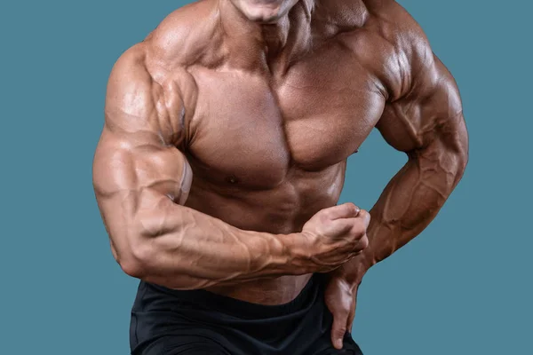 Handsome power athletic man on diet training pumping up muscles — Stock Photo, Image