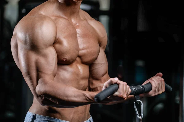 Handsome power athletic man on diet training pumping up muscles — Stock Photo, Image