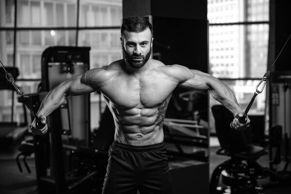 Brutal caucasian handsome fitness men on diet training chest pum