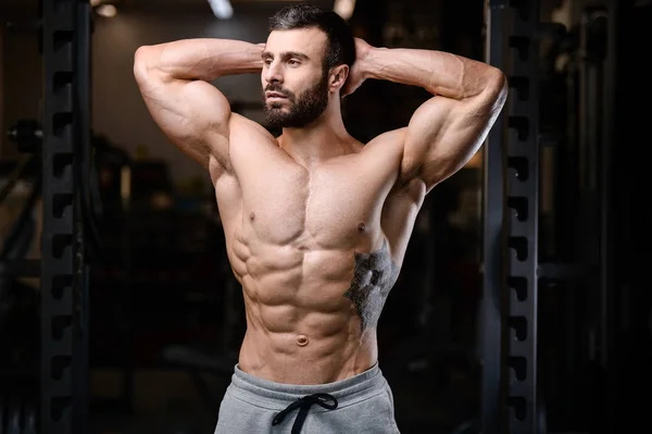 Caucasian sexy fitness model in gym close up ab — Stock Photo, Image