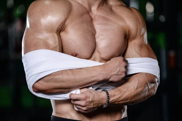 Attractive model young man training in gym — Stock Photo © antondotsenko  #171927998