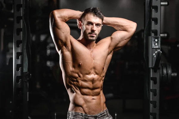 Caucasian sexy fitness model in gym close up ab — Stock Photo, Image