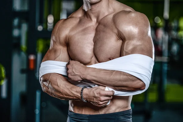 Attractive model young man training in gym — Stock Photo, Image