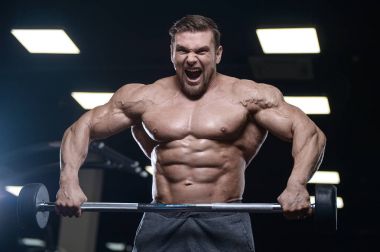 D ile kasları kadar pompalama acımasız güçlü vücut geliştirmeci atletik erkek