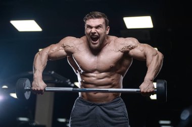 D ile kasları kadar pompalama acımasız güçlü vücut geliştirmeci atletik erkek