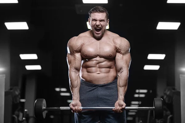 Βάναυση bodybuilder ισχυρή άντληση τους μυς με d αθλητική ανδρών — Φωτογραφία Αρχείου