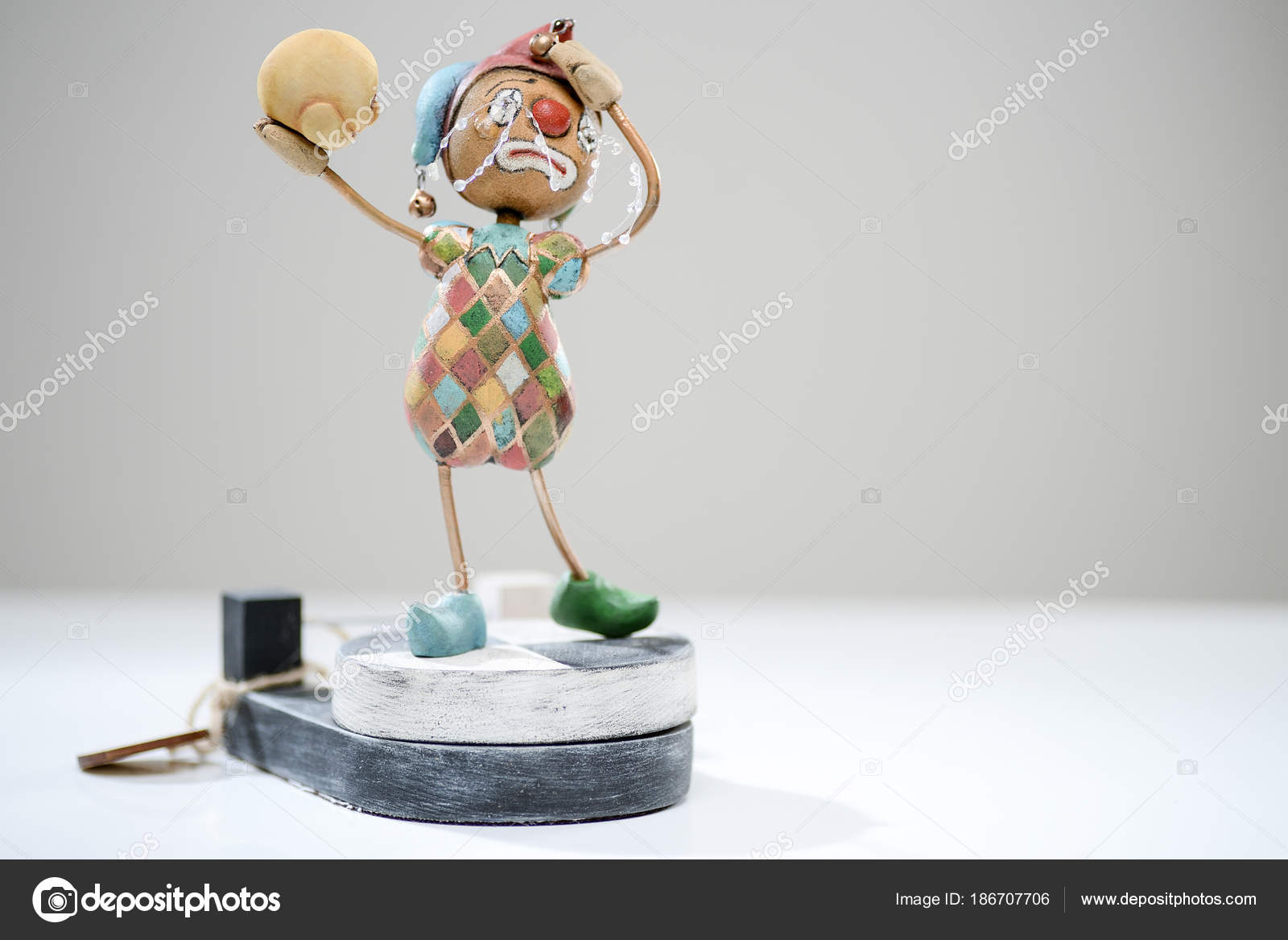 sad clown porcelain doll