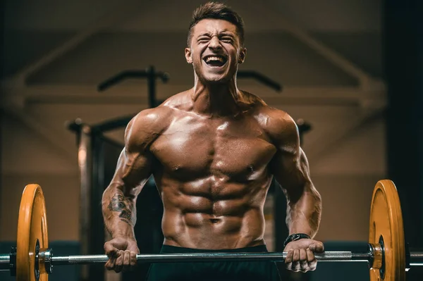 Красивые сильные атлетичные мужчины накачивают бицепсы мышцы тренировки f — стоковое фото