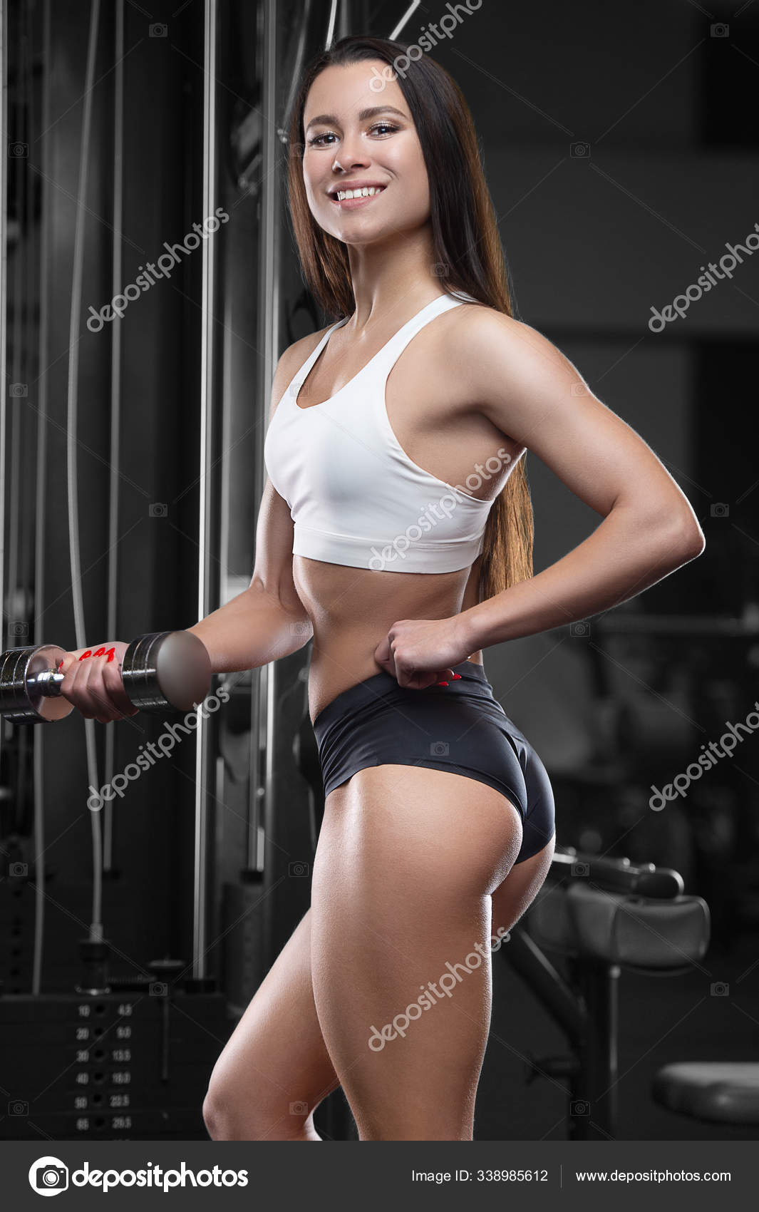 Fitness Woman Pumping Up Muscles Biceps And Triceps Workout Fitness And  Bodybuilding Concept. Pretty Caucasian Girl In The Gym Background Arms  Exercises In Gym Naked Torso Stock Photo, Picture and Royalty Free