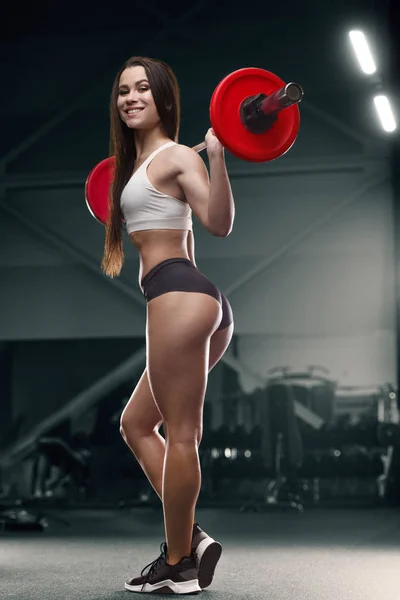 Fitness woman pumping up butt booty legs muscle — Stok fotoğraf