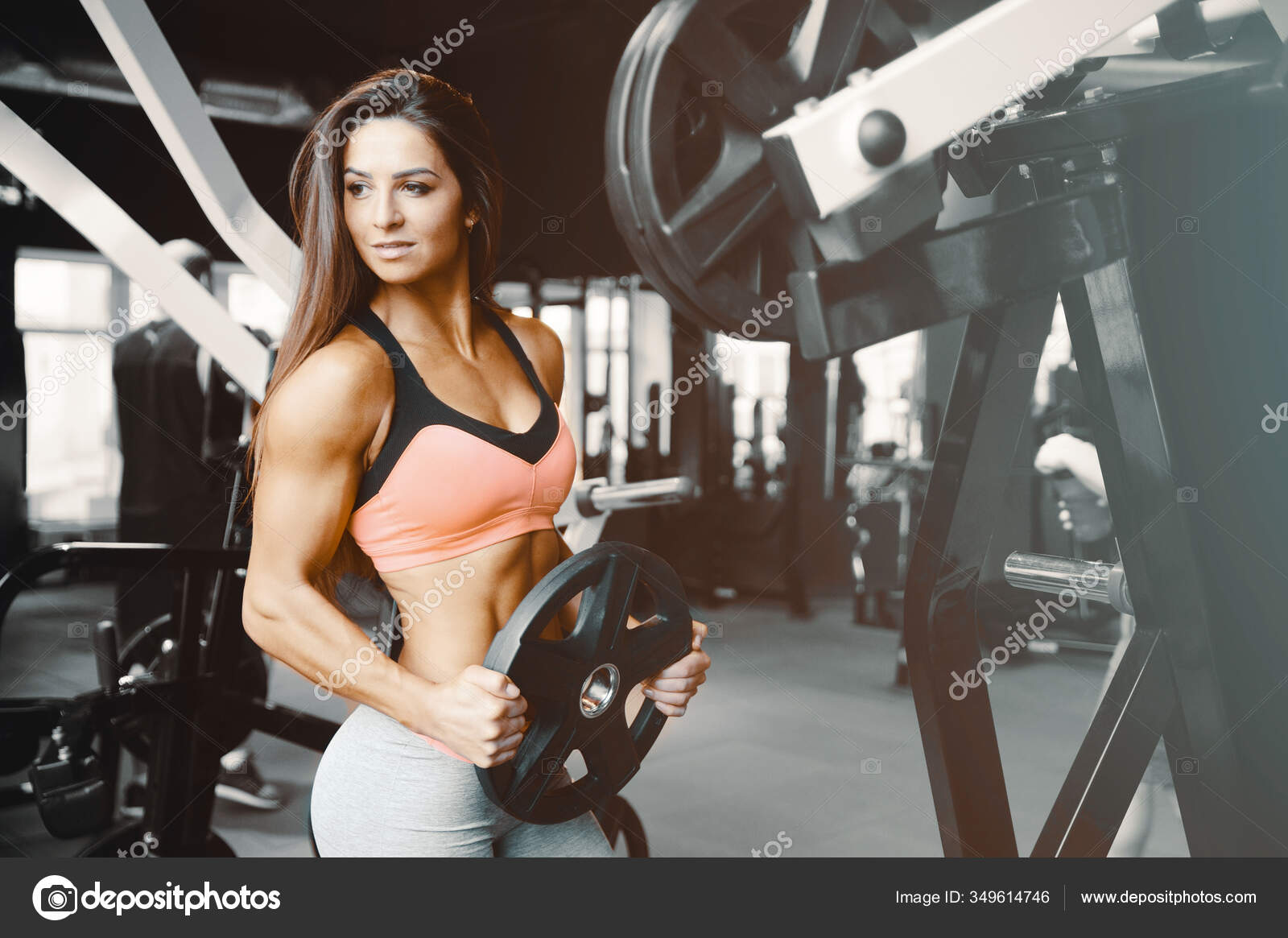 Fitness Woman Pumping Muscles Workout Pretty Caucasian Fitness Girl  Bodybuilding Stock Photo by ©antondotsenko 349614746