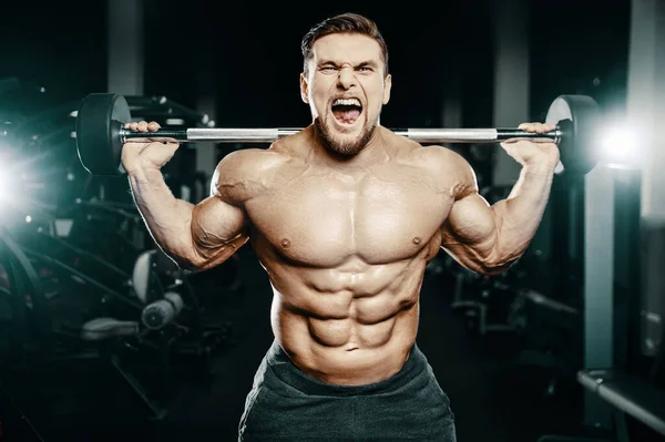 Homem Bombeamento Para Cima Músculos Perna Treino Fitness Musculação Conceito — Fotografia de Stock