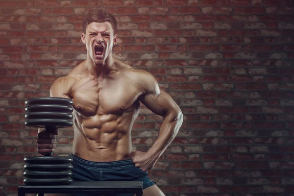 Culturista Guapo Fuerte Atlético Áspero Hombre Bombeando Los Músculos Abdominales —  Fotos de Stock