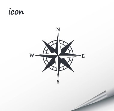 Vector compass icon on a wrapped silver sheet clipart