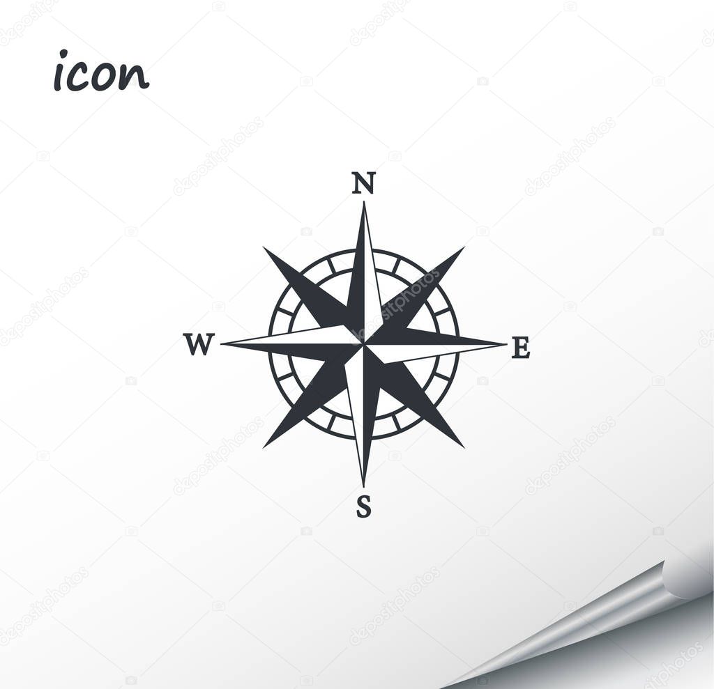 Vector compass icon on a wrapped silver sheet