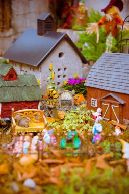 Fairy garden with gnomes. clipart