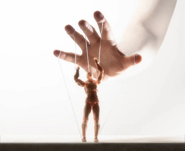 Concept Control Marionette Human Hand Image White — Stock Photo, Image