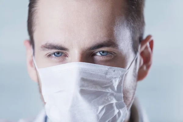 young scientist in protective mask