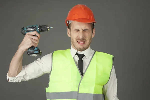 Builder Wearing Helmet Triying Shoot Himself Screwdriver — Stock Photo, Image