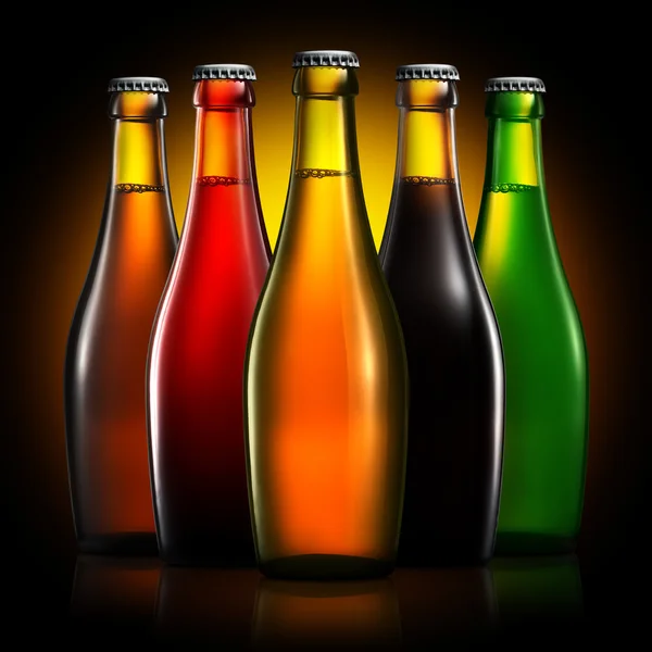 Set van bierflesjes geïsoleerd op zwarte achtergrond — Stockfoto