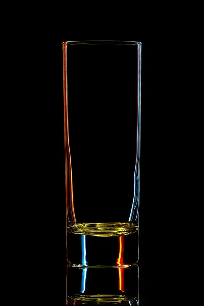 Silhouette of colorful cocktail glass on black — Stock Photo, Image