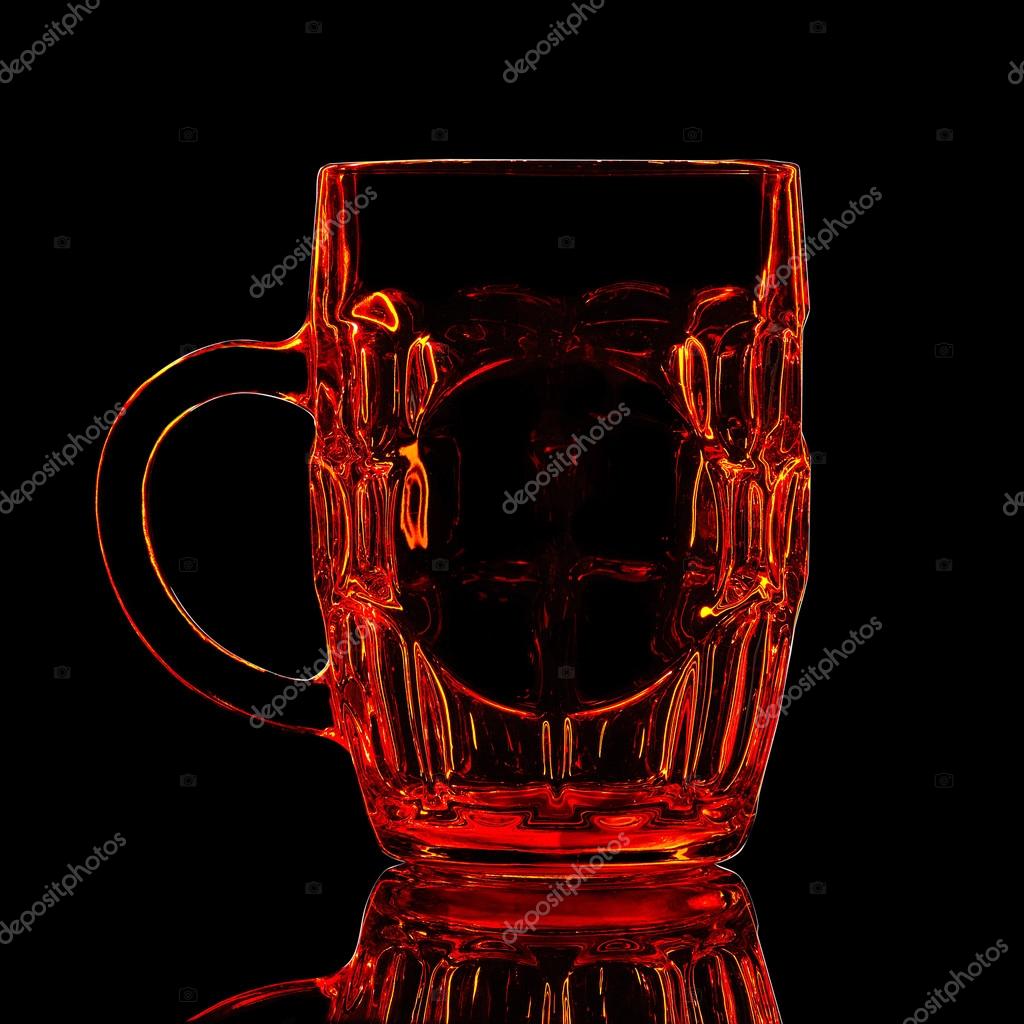 Silhouette of red beer glass with clipping path on black background.