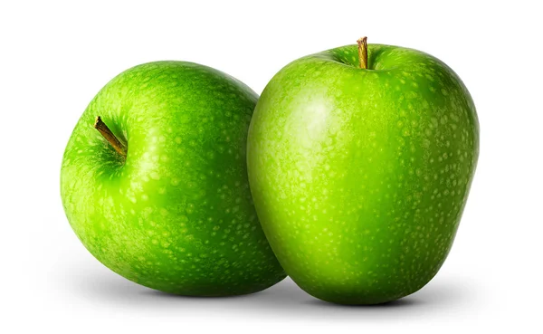 Grupp av gröna äpplen på vit bakgrund — Stockfoto