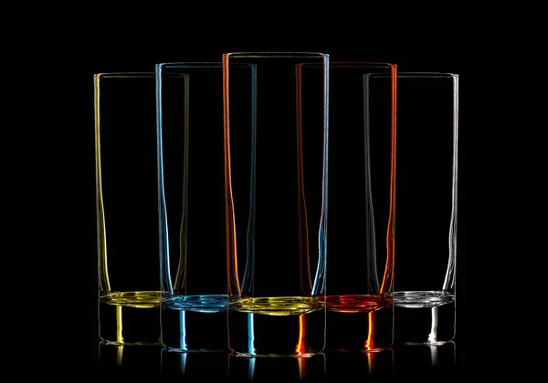 Silhouette of multicolor cocktail glass on black — Stock Photo, Image