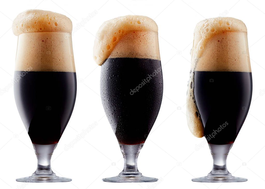 Mug of frosty dark beer with foam