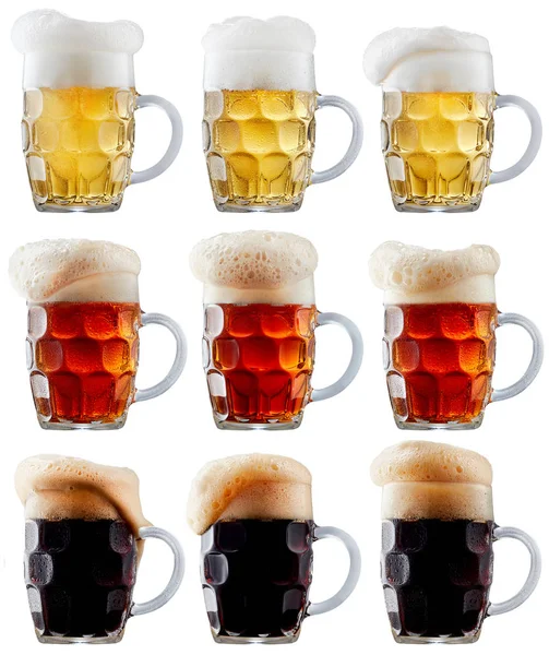 Коллекция кружек холодного пива с пеной — стоковое фото