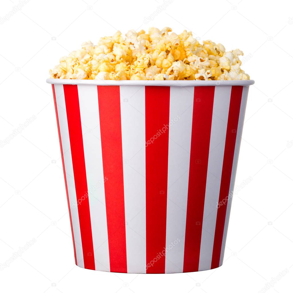 Paper striped bucket with popcorn isolated on white background